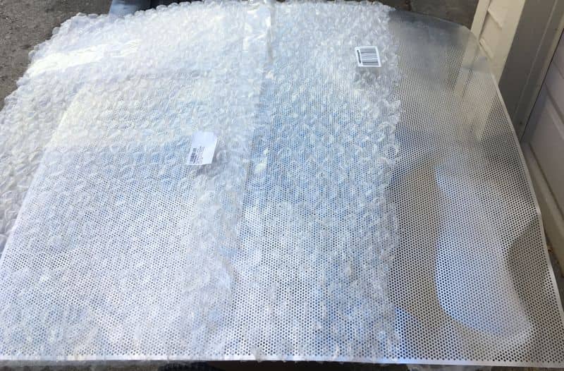 Uncut sheet of perforated aluminum